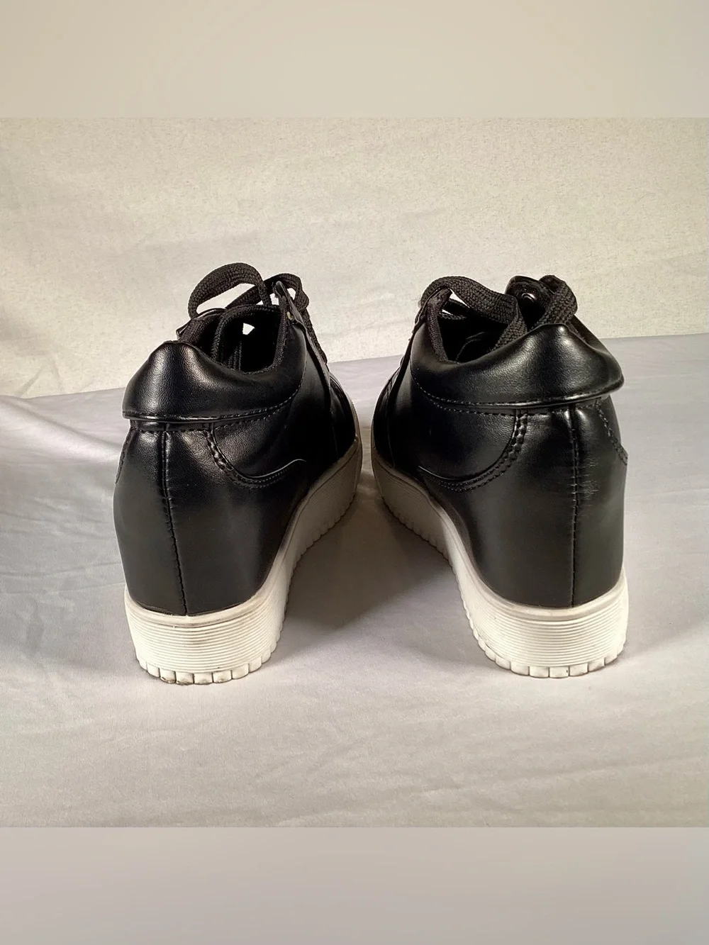 Women’s Black wedge sneakers with hidden heel ankle high platforms